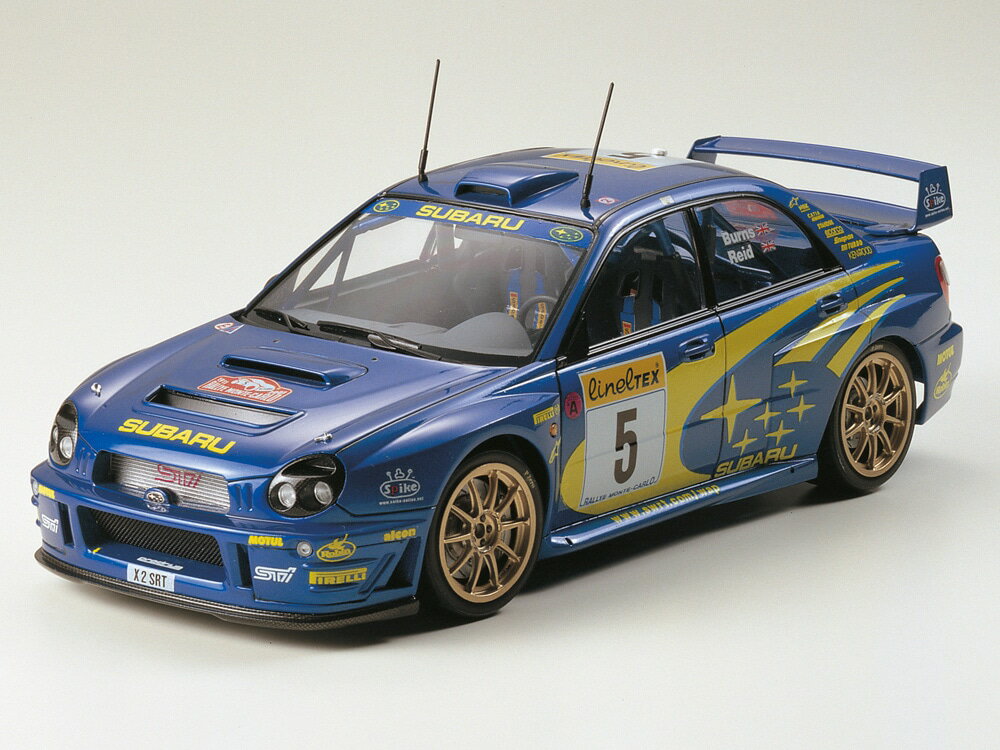 【 スバル インプレッサ WRC 2001について 】?2001年の世界ラリー選手権制覇のためにスバルが送り込んだマシンがインプレッサ WRC 2001です。
ブリスタータイプのオーバーフェンダーを持つ4ドアボディを採用し、水平対向4気筒ターボエンジンを搭載。
スロットルをはじめ、セミ・オートマチックトランスミッション、さらにフロント・センター・リヤのデフなど各部が高度に電子制御化されています。
4人のドライバーの中でR. バーンズは2001年のチャンピオンを獲得したのです。

【 模型要目 】
★スケール1/24、全長183.5mm、全幅75mm。 
★モンテカルロラリーに参戦したターマック仕様をモデル化。 
★迫力あふれるフォルムはもちろん、ロールケージを張り巡らした室内もラリー装備を余すことなく再現。 ★ホイールはゴールド塗装ずみ、リヤランプはクリヤーレッド、サイドウインカーはクリヤーオレンジパーツで、美しい仕上がりが手軽に楽しめます。 
★グリル開口部用のメッシュ付き。 
★R. バーンズ、P. ソルベルグ、M. マルティン車の3種類のスライドマークをセット。
※写真はキットを組み立て、塗装したものです。【商品サイズ (cm)】(幅）：18.4