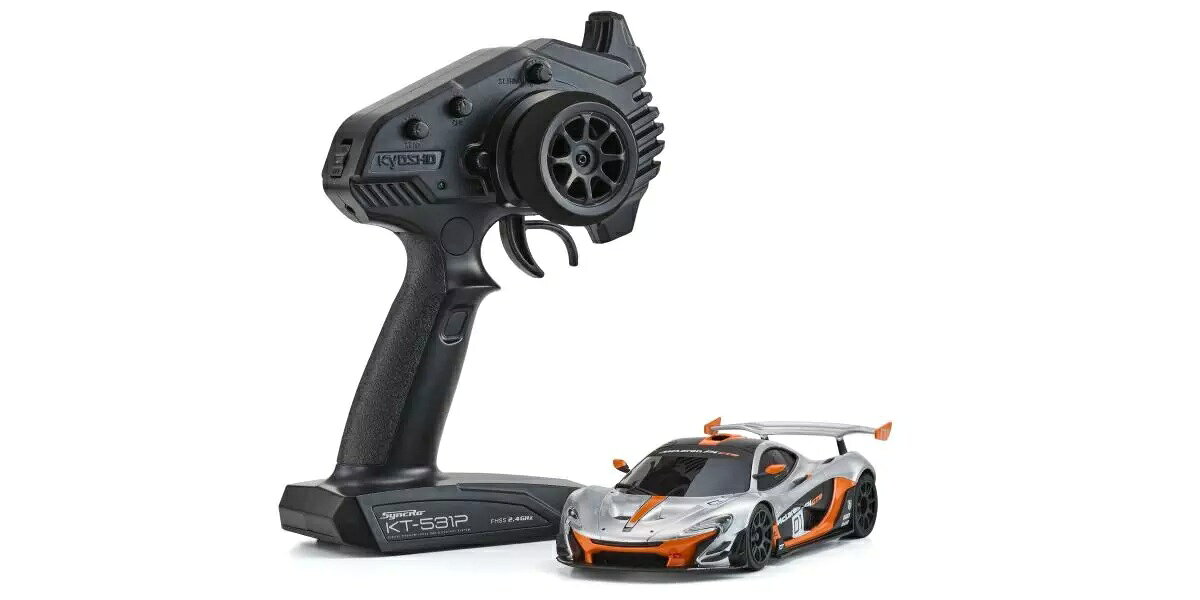 高性能を誇る最新MR-04シャシーが
ベーシックモデルのミニッツRWDについに登場！

パッケージを開封後、バッテリーを車体と送信機に入れればすぐに本格的なR/Cカーの操縦を満喫できる、それが京商製レディセットの魅力です。
中でもスモールスケールのミニッツレーサーは、室内で走行可能な手軽さもあって、R/Cカーの経験が少ない人にも最適といえます。
そんなミニッツレーサーの基幹モデルとでもいうべきリア2輪駆動シャシーのレディセット「ミニッツRWD」が新シャシーにリニューアルされます！　これまでのレディセットではリア2WDミニッツレーサーの第3世代MR-03シャシーを使用していましたが、今回のリニューアルでは、2023年にデビューした第4世代のMR-04シャシーがベースになります。
基本設計はMR-03を引き継ぎつつ、低重心化やステアリング回りの設計変更によって大幅な進化を果たしたMR-04は、ミニッツ最上級モデルのEVO2でデビューし、圧倒的な速さと操縦性のよさを披露しています。
そのMR-04シャシーにレディセット用のR/Cユニットを搭載して、ディスプレイモデルに匹敵するクオリティの完成済みボディを組み合わせました。
レディセット化にあたってもシャシー各部の材質変更はなく、クオリティはハイエンドモデルそのままです。
モーターは扱いやすい130クラスのブラシモーター、送信機はR/Cカーでポピュラーなステアリングホイール&ガングリップ型のSyncro KT-531Pと信頼性は抜群。
シャシーと送信機にそれぞれ単4型のアルカリバッテリー4本を搭載すれば走行可能状態になります。
標準状態で走行を楽しむだけでなく、豊富にそろったミニッツ用オプションパーツの使用により、トップクラスのレースでも通用するレベルのマシンに仕上げることもできます。
操縦にチューンナップ、さらには観賞用としても楽しめるミニッツRWDは、MR-04シャシーへのリニューアルによってオーナーをより高いレベルの本格R/Cカーの世界に誘ってくれます。

※別売のLEDライトユニットセット(No.MZW429R)はMcLaren P1 GTRに装着不可。

●室内で走行可能なスモールスケールの本格EP（電動）R/Cカー。
●シャシー&ボディは工場完成済みで、送信機も付属するレディセットで販売。
●付属する送信機は高い信頼性と多機能を誇るSyncro KT-531P。
●従来型のMR-03から大きく進化した最新MR-04シャシーを採用。
●ディスプレイモデルにもできるハイクオリティな塗装&デカール貼り済みボディが付属。
●ミニッツレーサーの全ボディが装着可能。※装着ボディに対応するモーターケースやデフギヤアッセンブリーが別途必要。
●スムーズな旋回を可能にするギヤ式デファレンシャル（ギヤデフ）を装備。
●フルボールベアリング仕様。
●操縦をよりイージーにするオプションのジャイロユニット（MZW711）が装着できる。ジャイロの感度もシャシーに装備したボリュームで調整可能。
●豊富に揃った各種ミニッツレーサー用オプションでのチューンナップも楽しめる。

テクニカルデータ
■全長 177.0mm
■全幅 76.0mm
■全高 44.0mm
■シャシータイプ MR-04W-MM
■ホイールベース 98.0mm （2L）
■トレッド F:64.5mm R:62.0mm
■フロントホイールオフセット ナロー +1.5mm
■リアホイールオフセット ワイド +1.5mm
■全備重量 167.6g
■使用プロポ Syncro KT-531P

キット内容
＜ レディセット内容 ＞
●工場完成シャシー
●塗装・マーキング工場完成ボディ
●Syncro KT-531P 2.4GHz送信機
●フロントトレッド変更用パーツ一式
●6T・7T・8T・9Tピニオンギヤ
●予備ホイールナット
●ホイールレンチ
●ピニオンはずし工具
●タイヤ・ホイール付属

走行までに必要なもの
＜ 走行に必要なもの ＞
●走行用単4アルカリ電池4本
●送信機用単4アルカリまたはニッケル水素電池4本

・ホビー系商品についての諸注意
メーカー都合により発売の大幅な延期が発生する可能性がございます。
予約商品についてはメーカーから順次入荷次第の発送となります。メーカー公表の発売日とは異なる場合がございますのでご了承ください。【対象年齢】：