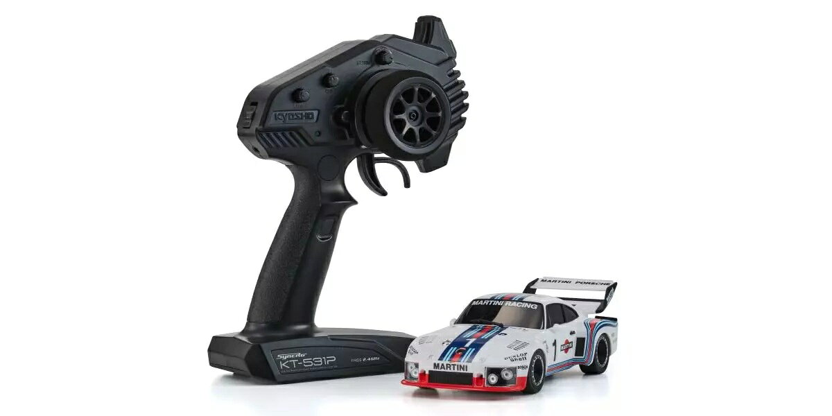 高性能を誇る最新MR-04シャシーが
ベーシックモデルのミニッツRWDについに登場！

パッケージを開封後、バッテリーを車体と送信機に入れればすぐに本格的なR/Cカーの操縦を満喫できる、それが京商製レディセットの魅力です。
中でもスモールスケールのミニッツレーサーは、室内で走行可能な手軽さもあって、R/Cカーの経験が少ない人にも最適といえます。
そんなミニッツレーサーの基幹モデルとでもいうべきリア2輪駆動シャシーのレディセット「ミニッツRWD」が新シャシーにリニューアルされます！　これまでのレディセットではリア2WDミニッツレーサーの第3世代MR-03シャシーを使用していましたが、今回のリニューアルでは、2023年にデビューした第4世代のMR-04シャシーがベースになります。
基本設計はMR-03を引き継ぎつつ、低重心化やステアリング回りの設計変更によって大幅な進化を果たしたMR-04は、ミニッツ最上級モデルのEVO2でデビューし、圧倒的な速さと操縦性のよさを披露しています。
そのMR-04シャシーにレディセット用のR/Cユニットを搭載して、ディスプレイモデルに匹敵するクオリティの完成済みボディを組み合わせました。
レディセット化にあたってもシャシー各部の材質変更はなく、クオリティはハイエンドモデルそのままです。
モーターは扱いやすい130クラスのブラシモーター、送信機はR/Cカーでポピュラーなステアリングホイール&ガングリップ型のSyncro KT-531Pと信頼性は抜群。
シャシーと送信機にそれぞれ単4型のアルカリバッテリー4本を搭載すれば走行可能状態になります。
標準状態で走行を楽しむだけでなく、豊富にそろったミニッツ用オプションパーツの使用により、トップクラスのレースでも通用するレベルのマシンに仕上げることもできます。
操縦にチューンナップ、さらには観賞用としても楽しめるミニッツRWDは、MR-04シャシーへのリニューアルによってオーナーをより高いレベルの本格R/Cカーの世界に誘ってくれます。

※別売のLEDライトユニットセット(No.MZW429R)はポルシェ 935 ターボ 1976 マルティニ #1に装着不可。
※2 ホイール/タイヤサイズが過去の製品と異なり通常サイズに変更しています。

●室内で走行可能なスモールスケールの本格EP（電動）R/Cカー。
●シャシー&ボディは工場完成済みで、送信機も付属するレディセットで販売。
●付属する送信機は高い信頼性と多機能を誇るSyncro KT-531P。
●従来型のMR-03から大きく進化した最新MR-04シャシーを採用。
●ディスプレイモデルにもできるハイクオリティな塗装&デカール貼り済みボディが付属。
●ミニッツレーサーの全ボディが装着可能。※装着ボディに対応するモーターケースやデフギヤアッセンブリーが別途必要。
●スムーズな旋回を可能にするギヤ式デファレンシャル（ギヤデフ）を装備
●フルボールベアリング仕様
●操縦をよりイージーにするオプションのジャイロユニット（MZW711）が装着できる。ジャイロの感度もシャシーに装備したボリュームで調整可能。
●豊富に揃った各種ミニッツレーサー用オプションでのチューンナップも楽しめる。

テクニカルデータ
■全長 179.5mm
■全幅 79.0mm
■全高 49.0mm
■シャシータイプ MR-04N-RM
■ホイールベース 86.0mm （S）
■トレッド F:61.5mm R:65.0mm
■フロントホイールオフセット ナロー +2.5mm
■リアホイールオフセット ワイド +3.0mm
■全備重量 174.8g
■使用プロポ Syncro KT-531P

キット内容
＜ レディセット内容 ＞
●工場完成シャシー
●塗装・マーキング工場完成ボディ
●Syncro KT-531P 2.4GHz送信機
●フロントトレッド変更用パーツ一式
●6T・7T・8T・9Tピニオンギヤ
●予備ホイールナット
●ホイールレンチ
●ピニオンはずし工具
●タイヤ・ホイール付属

走行までに必要なもの
＜ 走行に必要なもの ＞
●走行用単4アルカリ電池4本
●送信機用単4アルカリまたはニッケル水素電池4本

・ホビー系商品についての諸注意
メーカー都合により発売の大幅な延期が発生する可能性がございます。
予約商品についてはメーカーから順次入荷次第の発送となります。メーカー公表の発売日とは異なる場合がございますのでご了承ください。【対象年齢】：