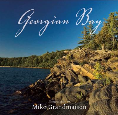 Georgian Bay's pristine beaches and windswept, rocky islands provide a summer haven for Canadians and Americans alike. Whether it's a slice of glacier-scraped granite inhabited by a lone white pine or an abstract composition of cobalt blue water shimmering in the afternoon sun, Grandmaison's photographs convey an intimate knowledge of the area's unforgettable beauty.
