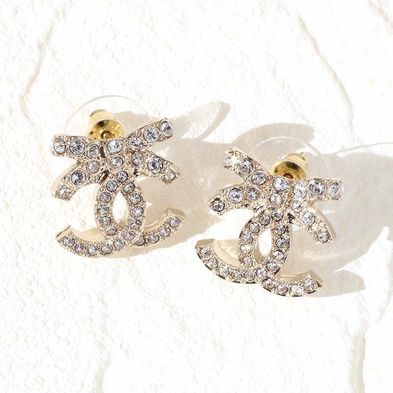シャネル CHANEL ピアス CCマーク メタル＆ストラス ラインストーン ダブルC ゴールド リボン 両耳用 レディース ウィメンズ BOUCLES OREILLES COCO GOLD ABA922 B10960 N0010 23Sのサムネイル