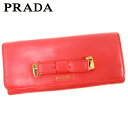 【春の大感謝祭 30％OFF】プラダ 長財布 ファスナー付き 長財布 リボンモチーフ オレンジ レザー PRADA 長サイフ サイフ 収納 ユニセックス 小物 【プラダ】 T10498 【中古】