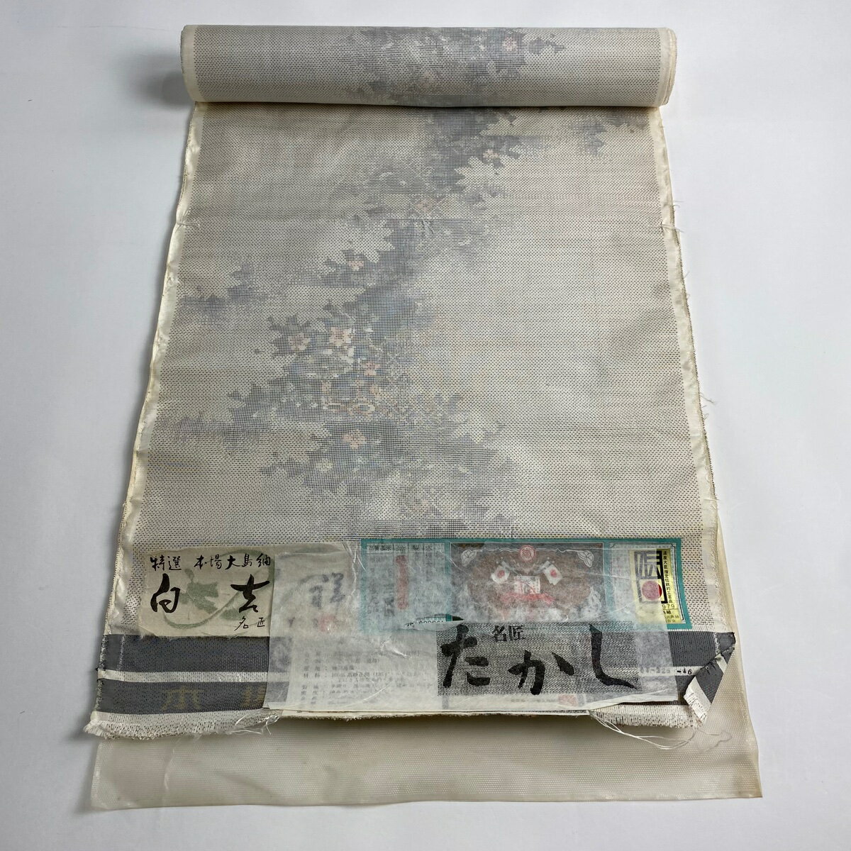 反物 名品 大島紬 名匠たかし 証紙 草花 シルエット 灰白 正絹 【中古】のサムネイル