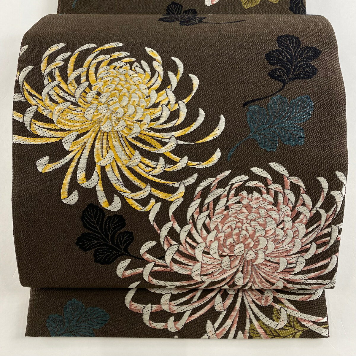 袋帯 美品 名品 全通長尺両面 紬地 乱菊 焦茶色 全通 正絹 【中古】のサムネイル