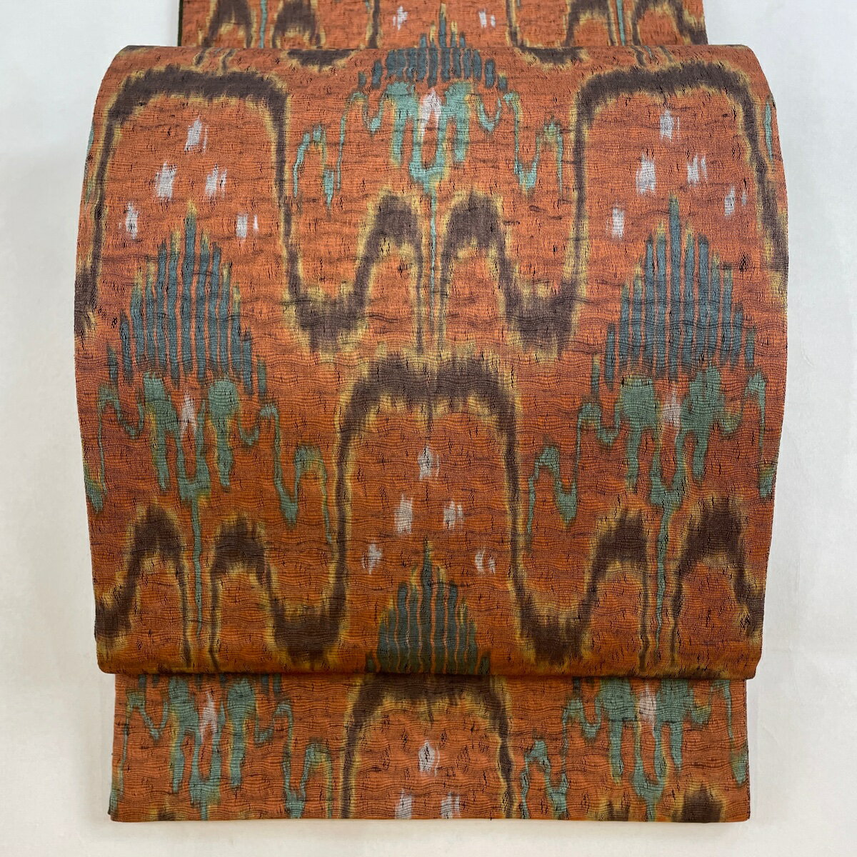 袋帯 美品 秀品 幾何学模様 赤茶 全通 正絹 【中古】のサムネイル