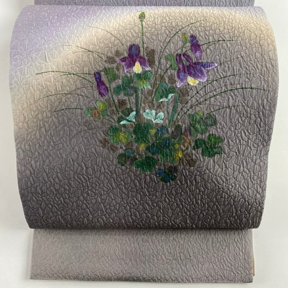 袋帯 美品 秀品 証紙あり 草花 染め分け ぼかし 灰紫 お太鼓柄 正絹 【中古】のサムネイル