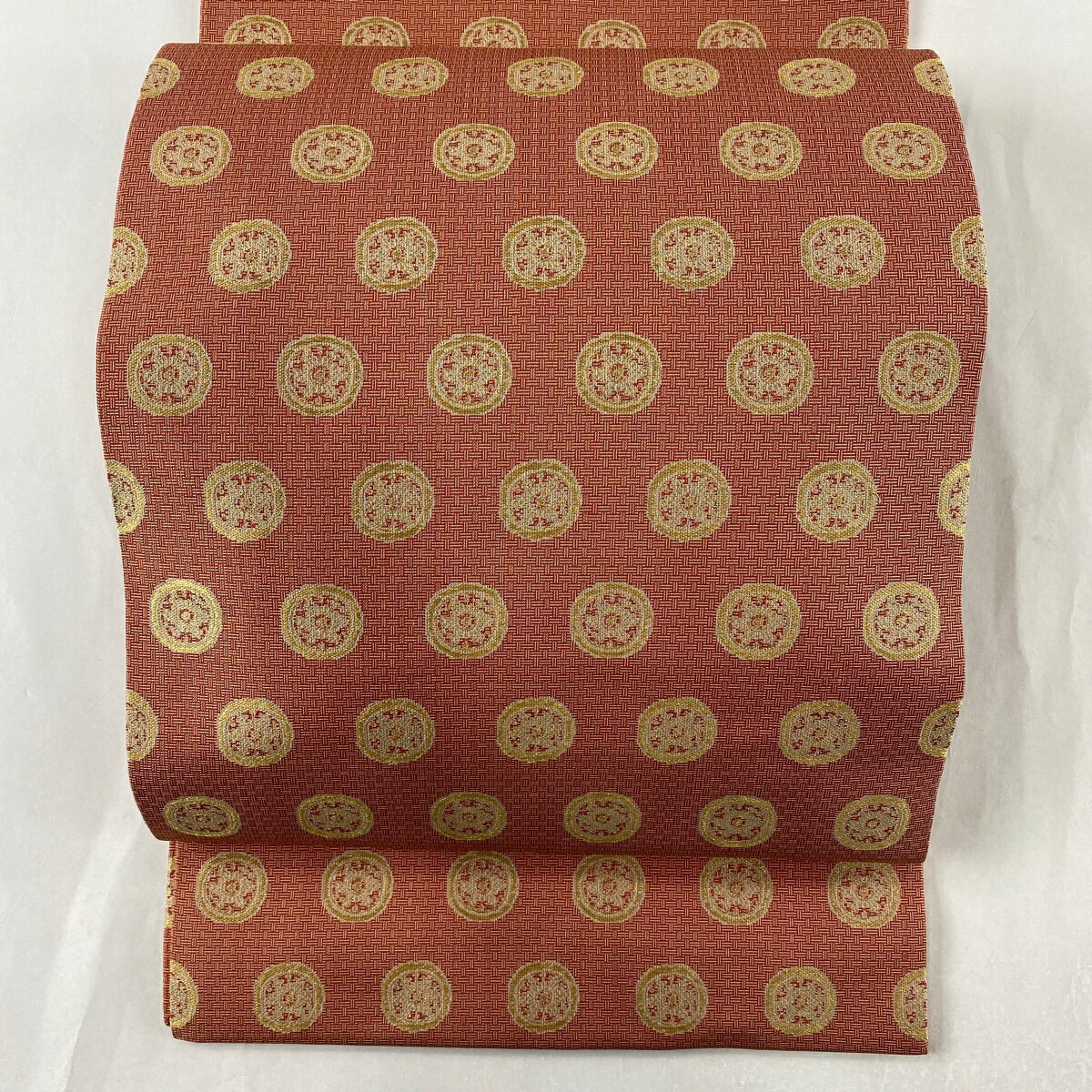 開き名古屋帯 美品 名品 龍村美術織物 丸文 金糸 茜色 正絹 【中古】のサムネイル