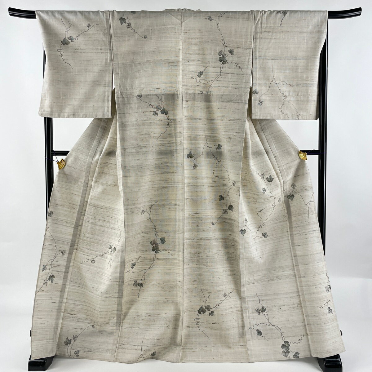 小紋 美品 逸品 紬地 蔦 ベージュ 単衣 身丈170cm 裄丈67cm M 正絹 【中古】のサムネイル