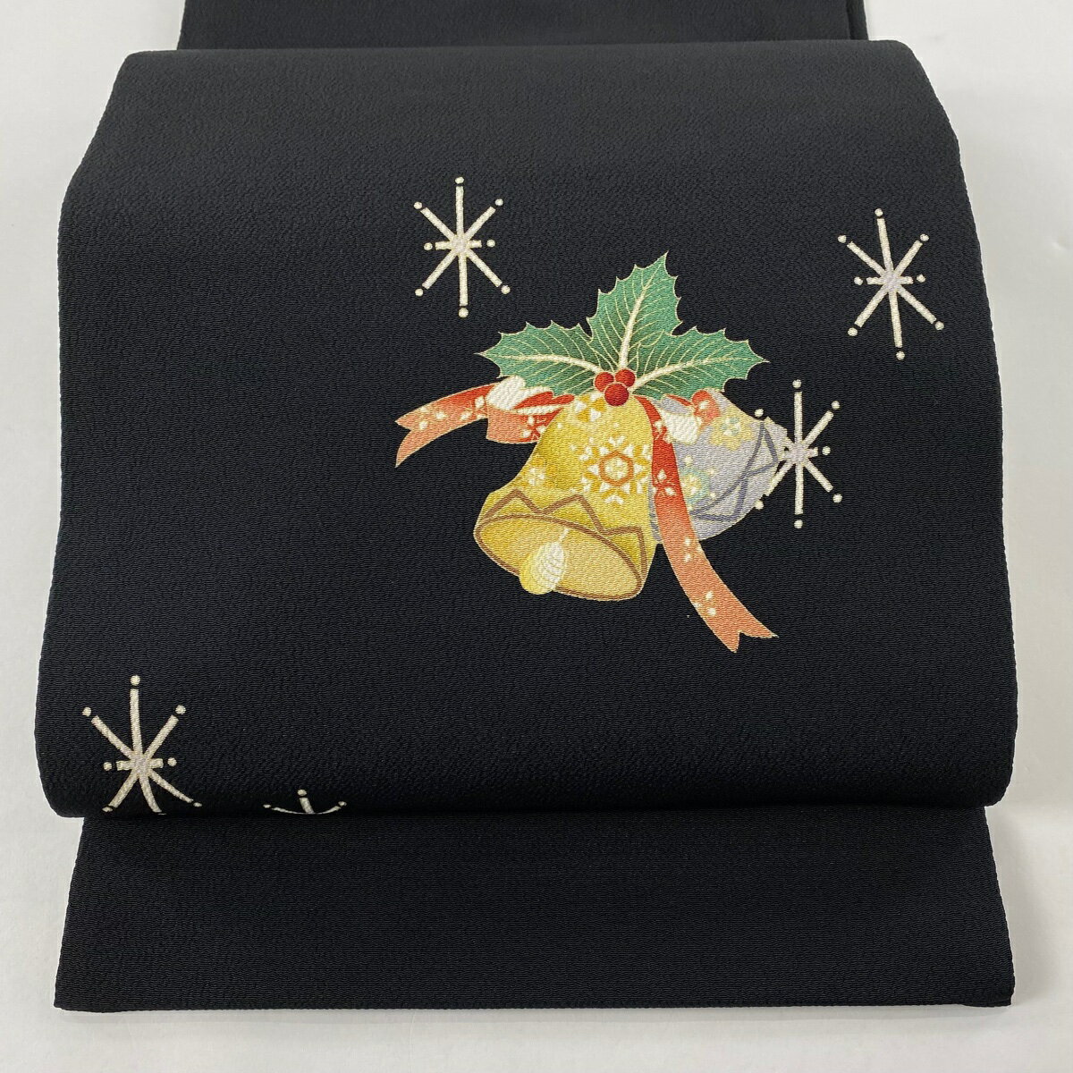 開き名古屋帯 美品 逸品 クリスマス柄 ベル 縮緬 黒 正絹 【中古】のサムネイル