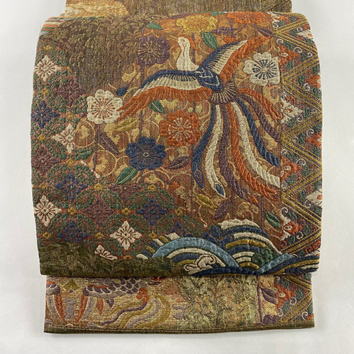 袋帯 美品 名品 落款あり じゅらく 尾長鳥 桜 箔 銀糸 茶紫 お太鼓柄 正絹 【中古】のサムネイル