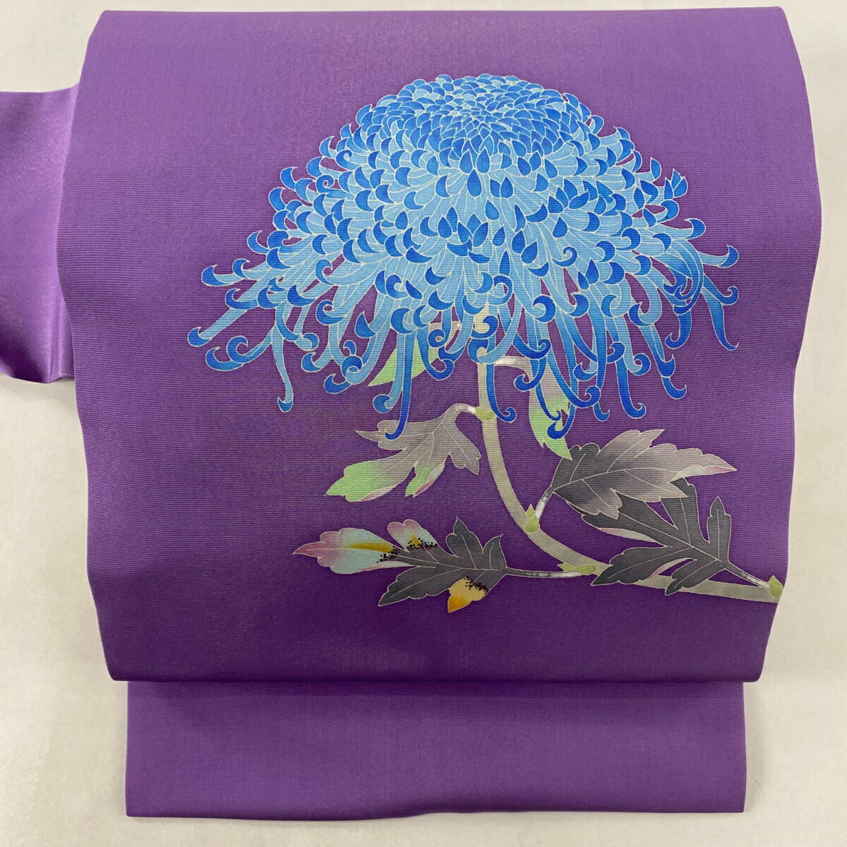 名古屋帯 美品 逸品 落款あり 百貫華峰 菊 銀糸 紫 正絹 【中古】のサムネイル