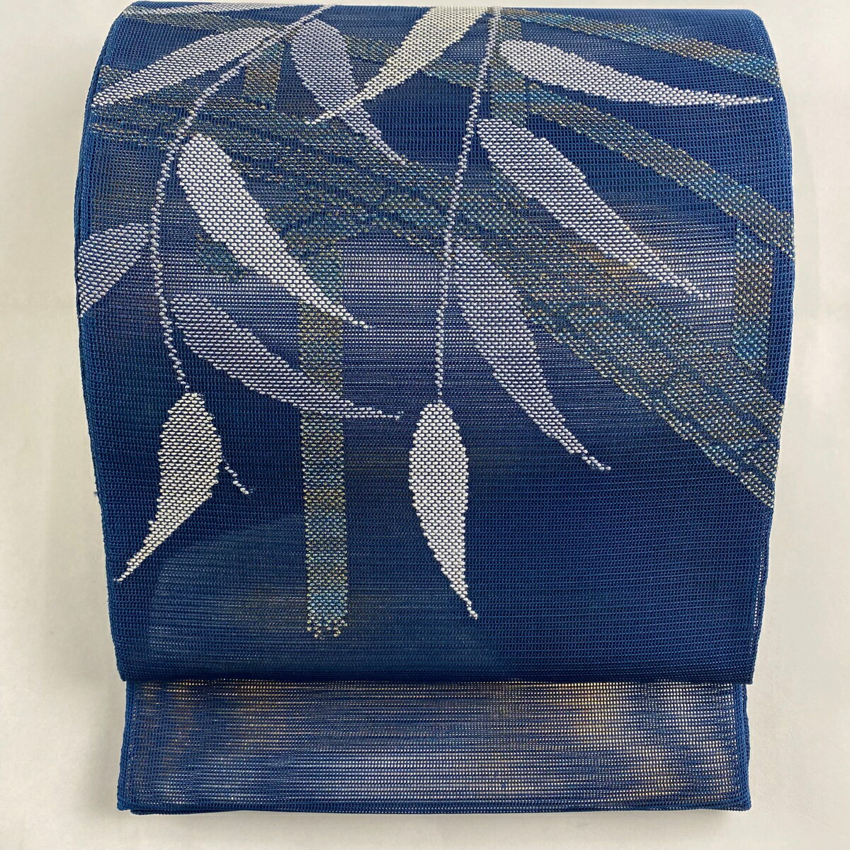 袋帯 美品 秀品 夏帯 葉 箔 紺色 お太鼓柄 正絹 【中古】のサムネイル