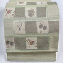 袋帯 名品 個性的 さるカニ合戦 銀糸 箔 薄緑 お太鼓柄 正絹 【中古】