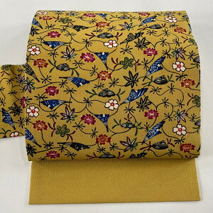 名古屋帯 美品 逸品 落款あり 伊差川紅型工房 伊と幸 草花 葉柄 紅型 縮緬 山吹色 正絹 【中古】