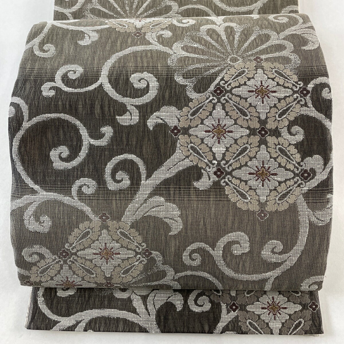袋帯 美品 名品 華文 花唐草 金糸 箔 灰茶 お太鼓柄 正絹 【中古】 msp30