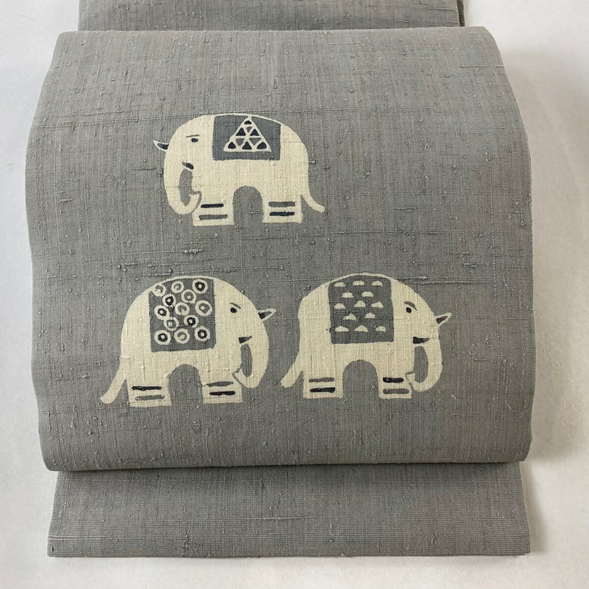 開き名古屋帯 名品 紬地 象 灰色 正絹 【中古】のサムネイル