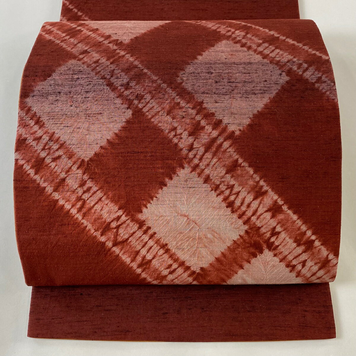 袋名古屋帯 美品 秀品 紬地 幾何学模様 菱 絞り えんじ色 正絹 【中古】