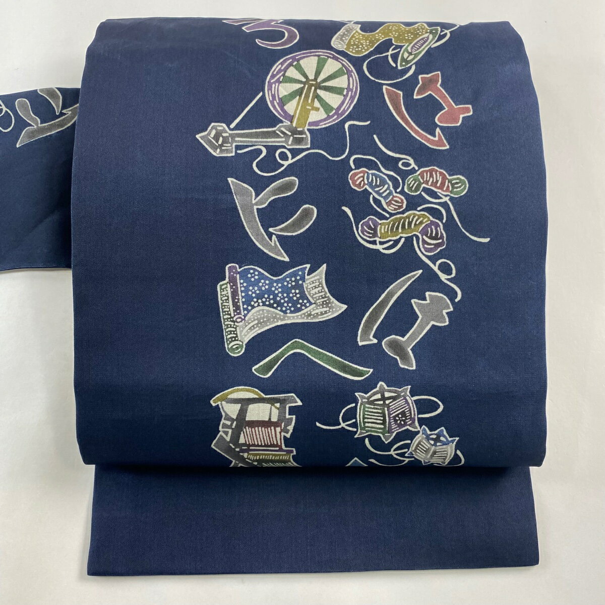 名古屋帯 秀品 紬地 糸車 いろは文字 濃紺 正絹 【中古】 msp50