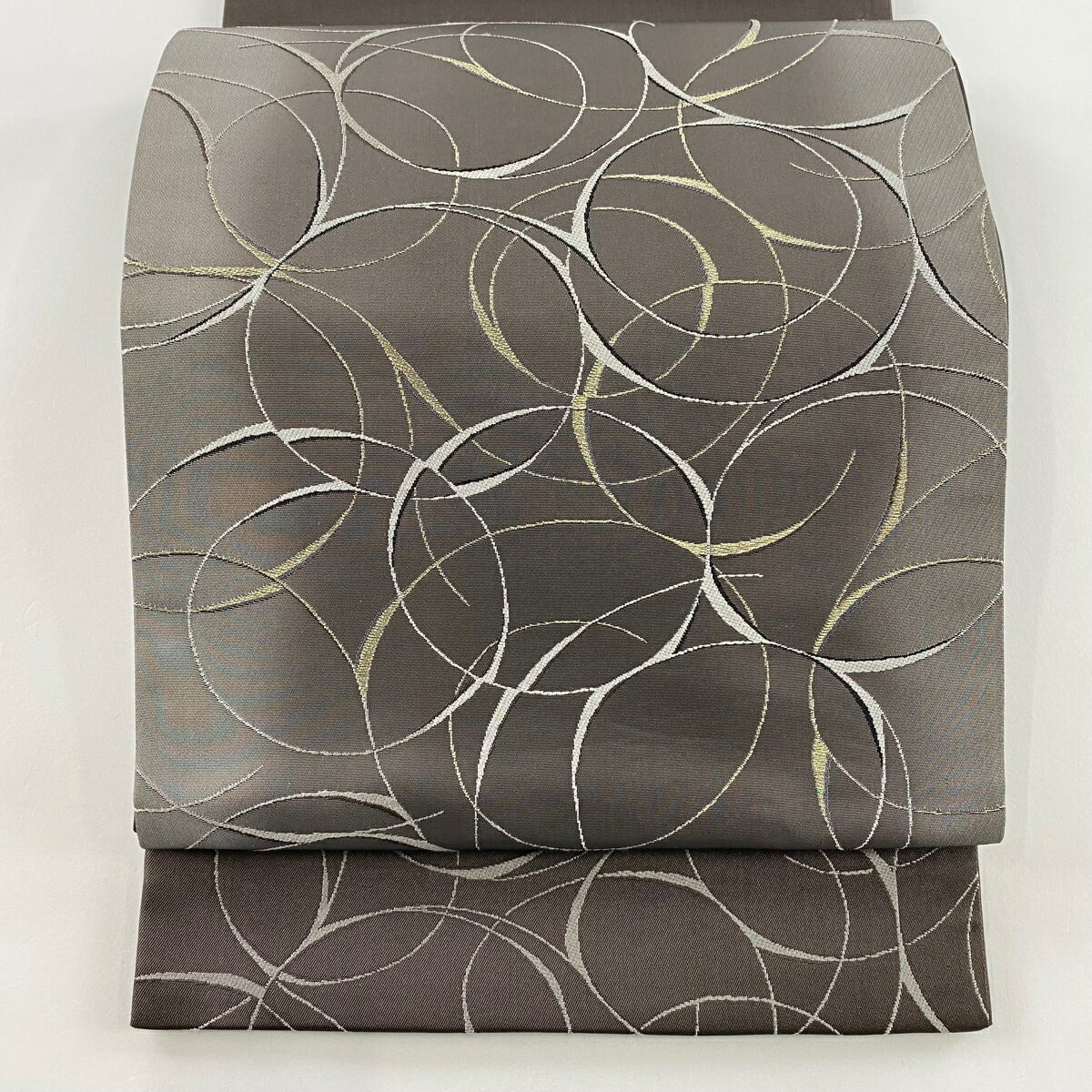 【美品】 袋帯 名品 加納幸 落款あり 丸 幾何学模様 銀糸 箔 灰茶 お太鼓柄 正絹 【中古】