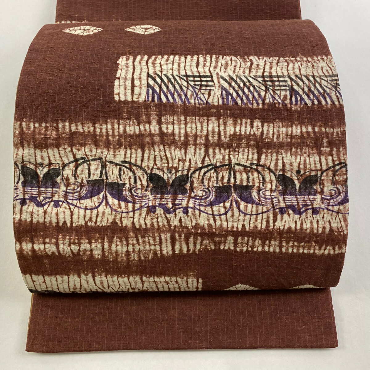 袋帯 秀品 紬地 蝶 幾何学模様 絞り 小豆色 お太鼓柄 正絹 【中古】