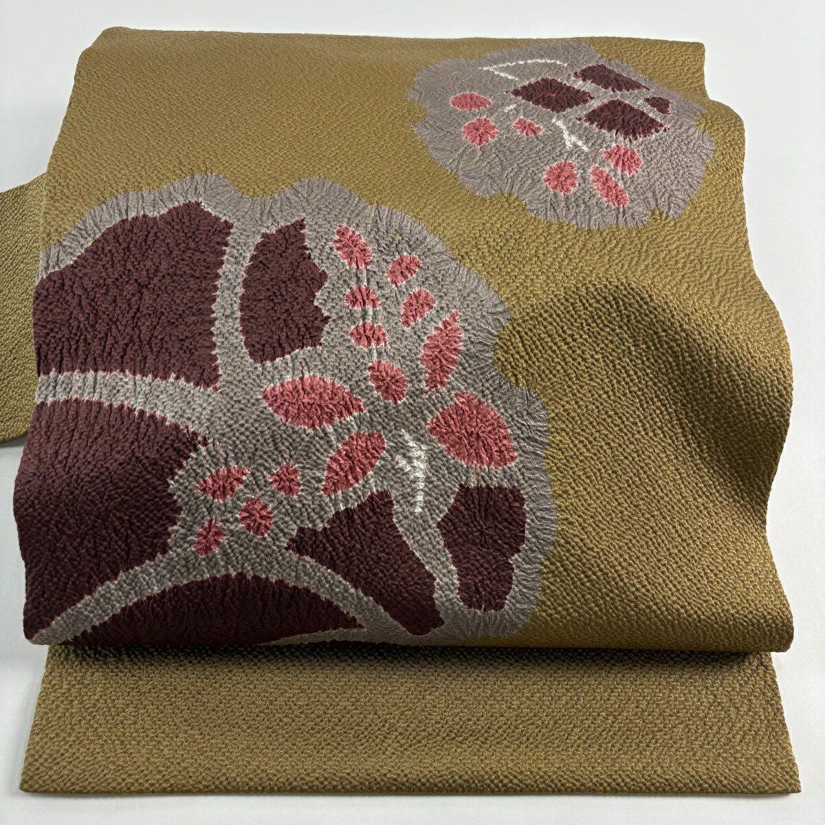 名古屋帯 秀品 雪輪 葉柄 絞り 薄茶色 正絹 【中古】