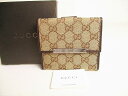 【未使用保管品】 グッチ GUCCI GG キャンバス 2つ折り 財布 コンパクト財布 メンズ レディース 茶 【中古】