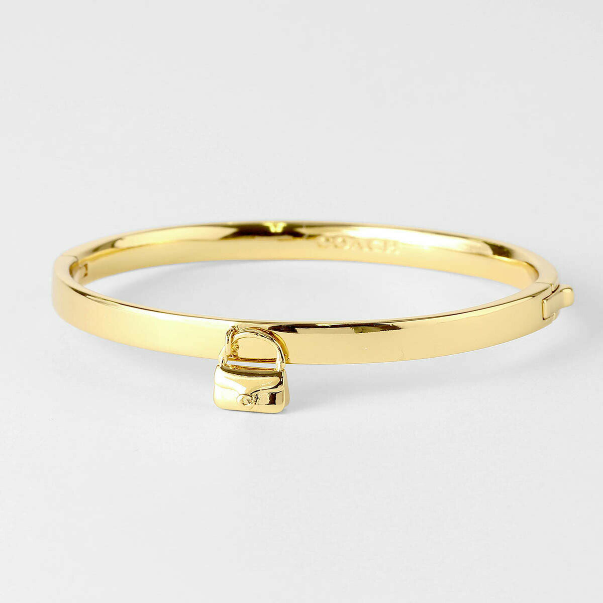 コーチ ブレスレット COACH シグネチャー ハンドバッグチャーム 534434 GLD710 レディース ゴールド 金【1万円で1,000円OFF★最大5,000円OFFクーポン配布中】