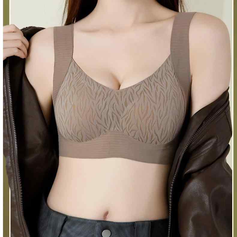 ブラジャー レディース シームレス 無痕 ノンワイヤー 揺れ防止 肩紐固定 薄型カップ 通気性 美背 快適..