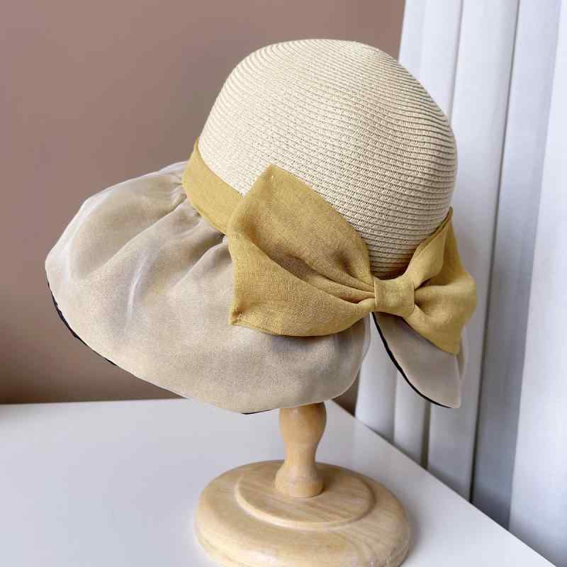 2麦わら帽子 レディース 漁夫帽 ブレードハット 帽子 日焼け防止 紫外線対策 ちょう結び付き ハット ブラック イエロー ホワイト Mサイズ 春夏 日韓風 淑女 リゾート 小清新 森ガール 仙女風・製品カテゴリ: 草帽 ・流行の要素: 蝶結び ・帽子のつばのタイプ: 大きなつば ・カラー: ブラック, イエロー, ホワイト ・サイズ: M（56-58cm） ・機能: 日焼け防止, 通気性, 防風, 遮光 ・スタイル: 日韓, 淑女, リゾート, 小清新, 森ガール, フェアリー ・生地: 布草拼接 ・スタイルの分類: 清新甜美 ・加工技術: その他