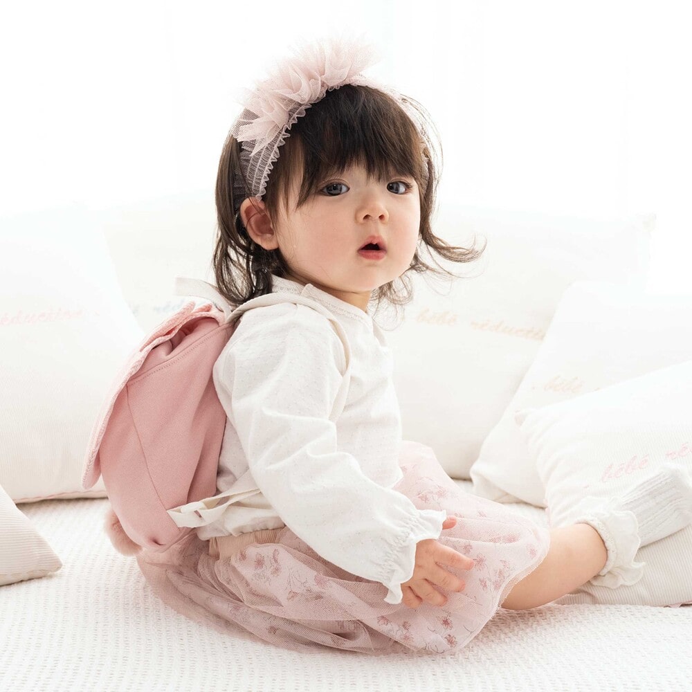 BEBE 公式 楽天市場店の20％OFFクーポン配布中・fillot de bebe reduction ミニ裏毛ポンポン付きリュックベビー ベビー服 リュック ベビーリュック ルウちゃん ティオンちゃん 耳付き ポンポン 一升餅 新生児 3ヶ月 6か月 1歳 出産祝い ギフト プレゼント｜アングル2