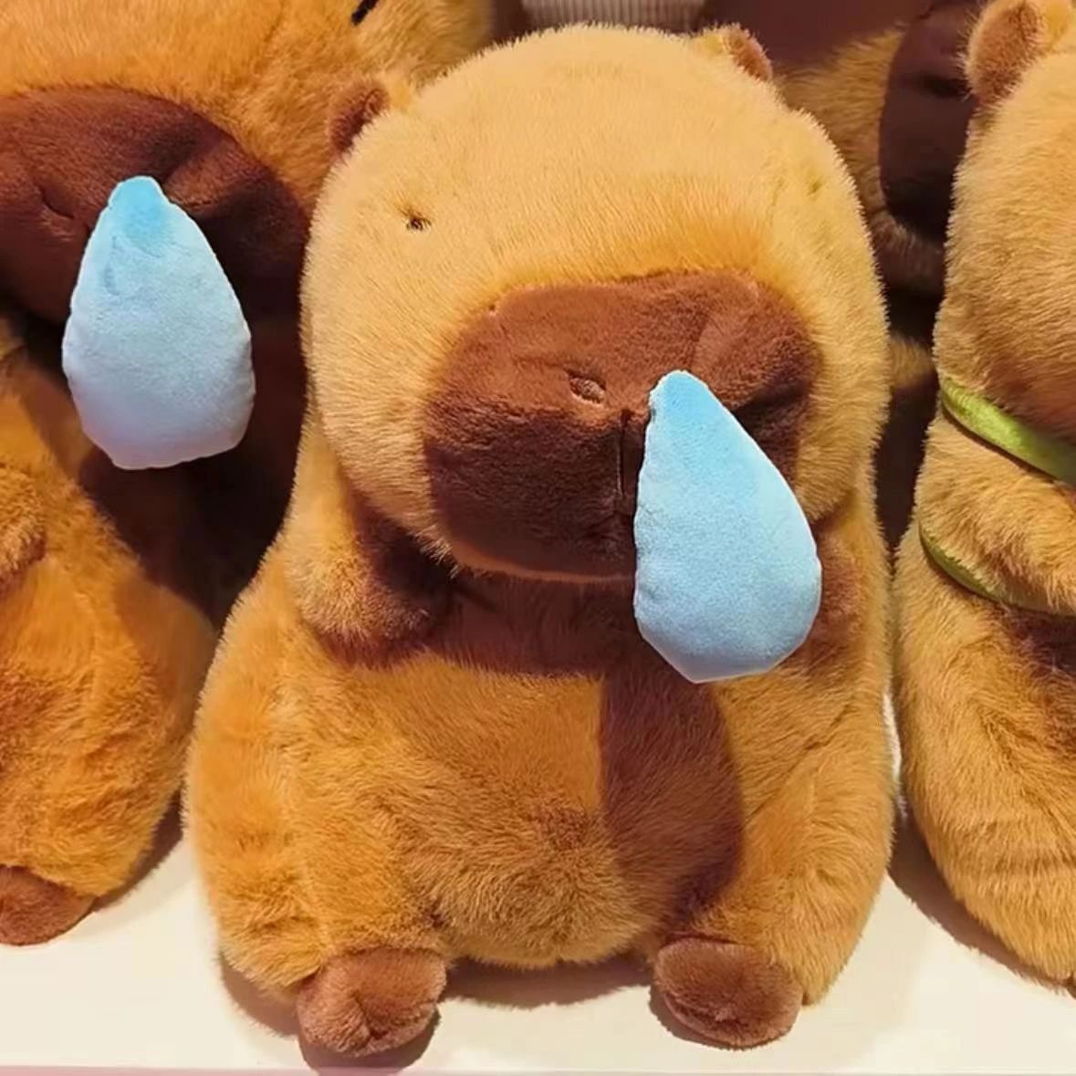 鼻の高いカピバラぬいぐるみ、鼻水カピバラぬいぐるみ、引っ張って使えるカピバラぬいぐるみ、漫画カピバラぬいぐるみフィギュア、柔らかい質感、カピバラ愛好家&家の装飾用