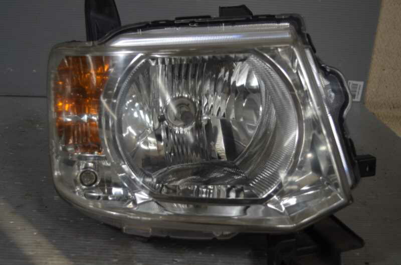 EKワゴン GS 前期(H82W) 純正 スタンレー 破損無 取付OK 動作保証 右 ヘッドライト ハロゲン レベライザー付 P6519 / 8301A602 K066874 中古20221128