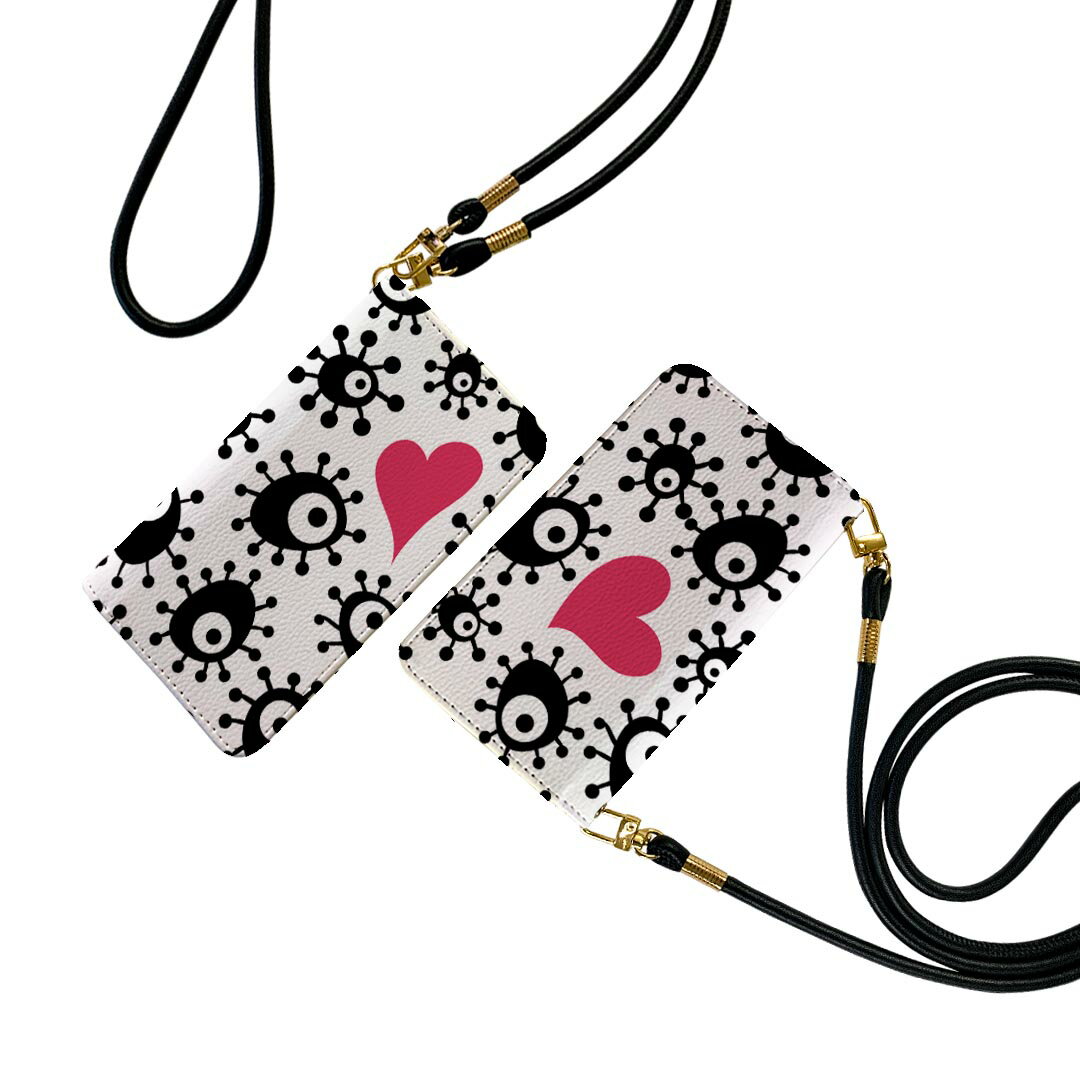 iPhone 16e 用 各キャリア 共通対応 iphone 16e 手帳型ケース ケース ストラップ付き ショルダー スマホ 落下防止 手帳型 マグネット式 ピタッと閉まる スマホカバー 肩掛け 斜めかけ 007845 ハート　モンスター　黒　ブラック