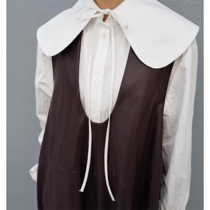 ・カテゴリ: シャツ・主素材: 綿50-70%・その他素材: ナイロン30-50%・柄: 無地・袖丈: 長袖・加工: 刺繡・フィット: ルーズ・着丈: ミドル丈・ネックライン: フリル・袖タイプ: レギュラー・デザイン: ボタン・カラー展開...