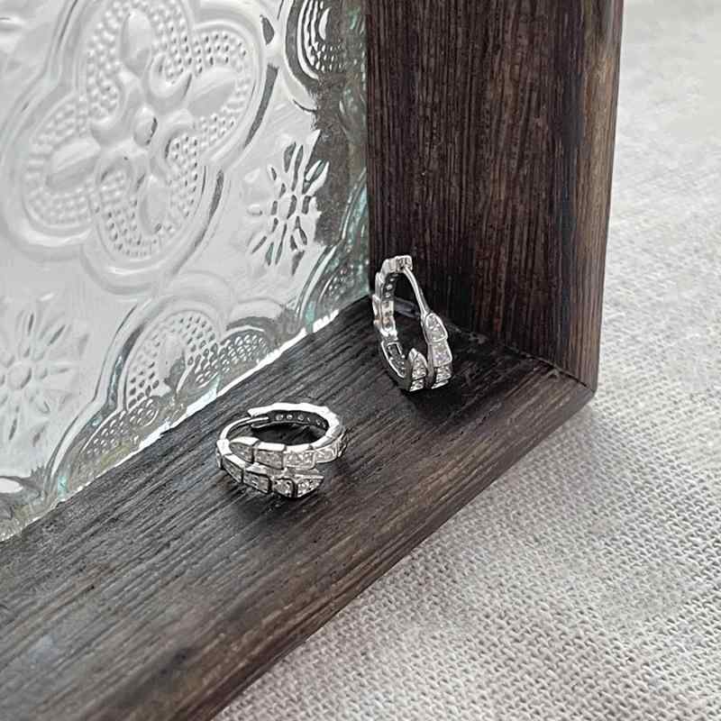 イヤリング 女性 蛇形 交差 シンプル デザイン ファッション 軽奢 精致 925シルバー ジルコニア 耳飾り