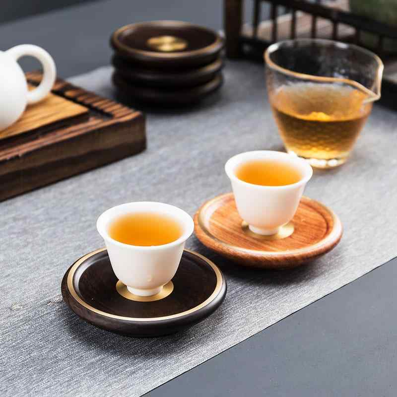 茶托セット 黒檀木 花梨木 純銅 日式実木 断熱 茶道アクセサリー クリエイティブ ティーカップマット 抹茶用 木製 金属加工 伝統工芸 インテリア雑貨 ギフト向き 日常使い 耐久性 自然素材 高品質仕上げ