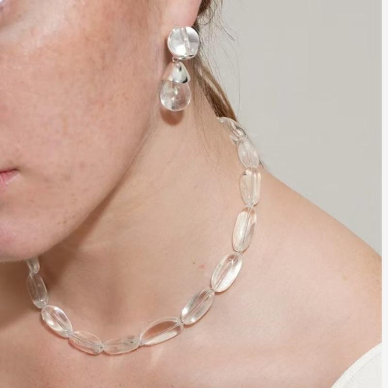 ピアス レディース 天然白水晶 ドロップ 不規則丸形 水滴型 個性 清新 クリア イヤーアクセサリー 多用途 天然素材