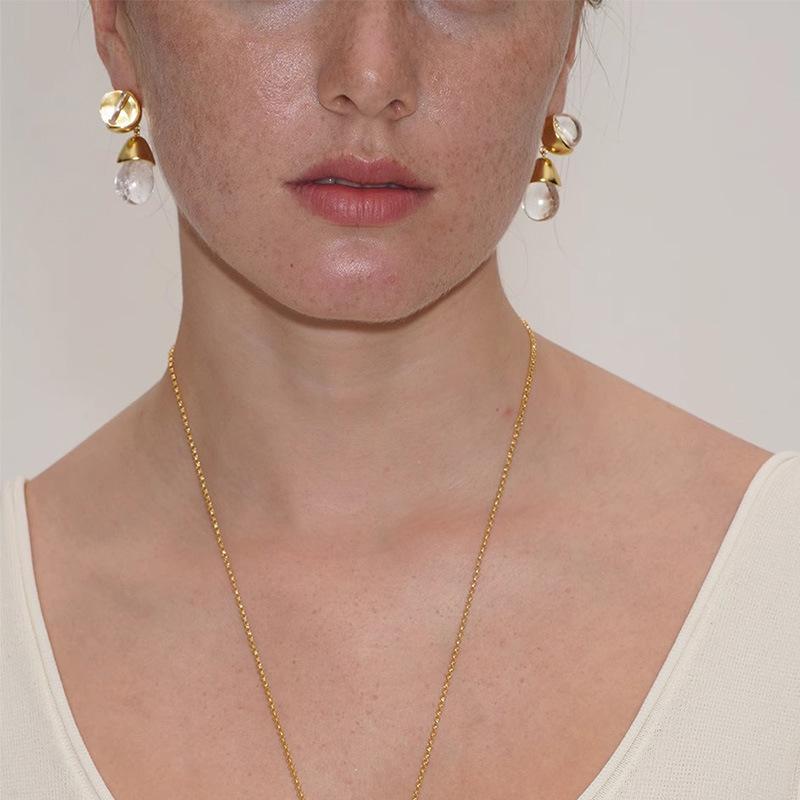 ピアスレディース白水晶水滴型不規則...