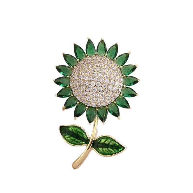 ブローチ レディース かわいい ひまわり柄 フラワーモチーフ ジルコニア インクラスト 微細加工 高級感..