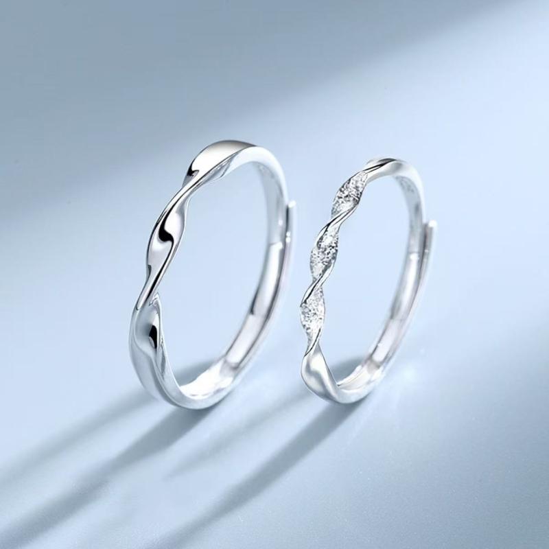 指輪 男女兼用 メビウスデザイン ジルコニア入り 開口調整可能 ペアリング 高級感 個性的 ユニーク