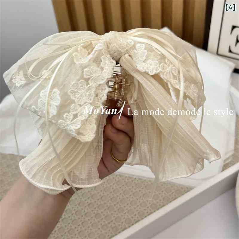 ・素材: 布地・スタイル: つかみクリップ・加工: 手作り・分類: ポニーテールクリップ・色: ベージュ・流行要素: 蝶結,フリンジ,不規則・スタイル: 韓国風・スタイル分類: 清新甘美・カテゴリ: ヘアアクセサリー・対象: 女性用