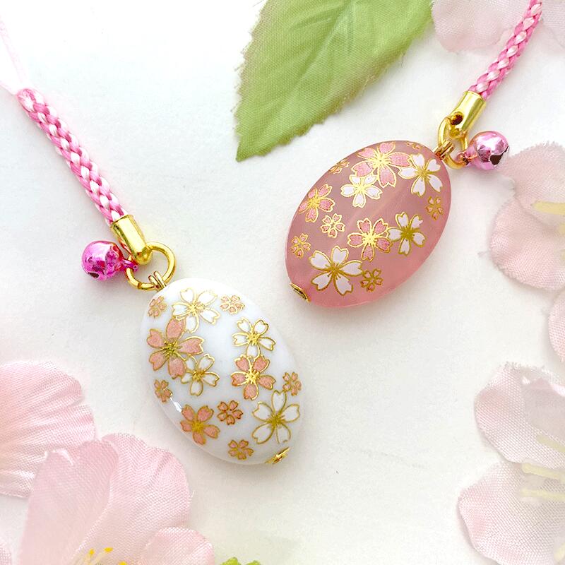 金襴 楕円 桜 根付 ( ホワイト / ピンク ) ストラップ キーホルダー 白 ピンク さくら 可愛い かわいい 鈴 ワンポイント すりガラス風 陶器風