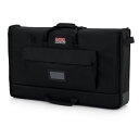 GATOR G-LCD-TOTE-MD トランスポート バッグパッド入りナイロン・キャリー・トートバッグ(LCD スクリーン(サイズ27″〜32″)の持ち運び用)■特徴・フォームフィッティング・ケース・ディール(27-32" LCD スクリーンにフィット) 25mm のPE フォーム・パッド入り(360° の衝撃吸収を保証)・強化フロント・カバー + ポリエチレン・スクリーン・シールド(飛散防止保護を実現)・デュアル・ジッパー・エンクロージャ(容易な積み上げ/下ろしが可能)・耐久性に優れたパッド状ナイロン・ハンドル ＆ 取り外し可能なショルダー・ストラップ(ギアのしっかりとしたグリップ感を実現)・25mm のPE フォーム・パッド入り(360° の衝撃吸収を保証)・トリコット・ファブリック・ライニング(頑丈ながらもソフトなフォーム・フィッティング・インテリアを実現)・広々としたエクステリア・アクセサリー・ポケット(ケーブル ＆ アクセサリーを整頓しつつ、クリア・ビニル・ウインドウがビジネスカードやID タグに絶妙にフィット)内装寸法Interior Length 30.4 "Interior Width 18.5 "Interior Height 3.22 "外装寸法Exterior Length 10 "Exterior Width 10 "Exterior Height 3.5 "Exterior Weight 1.4 lbsModel G-LCD-TOTE-MDUPC 716408542300Color ブラック