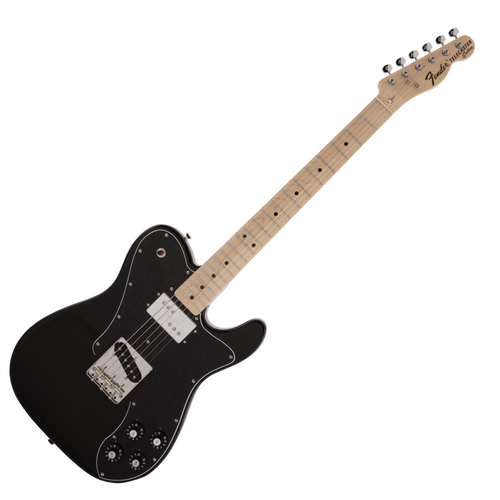 Fender Made in Japan Traditional 70s Telecaster Custom MN BLK エレキギターフェンダーの伝統的な楽器製作の美学と日本の洗練されたクラフトマンシップを融合することで導き出されたMade in Japan Traditionalシリーズ。フェンダーの正統なDNAが、確かなMade in Japanクオリティで蘇ります。Made in Japan Traditional 70s Telecaster Customはグロスフィニッシュのアッシュボディを採用。21本のヴィンテージスタイルフレットを装備した9.5インチラジアスの”U”シェイプメイプルネックがTraditionalシリーズならではのクラシカルな演奏製を提供します。3つのスロテッドバレル付きヴィンテージスタイルTeleブリッジ、そしてTraditionalシリーズのために選定されたオリジナルピックアップはリアルで音楽的なヴィンテージトーンを奏でます。細めに設計されたナット幅は日本のプレイヤーにも弾きやすい仕様となっています。堅実なギタークラフトマンシップと、プレイヤーのニーズに柔軟に対応する答えが、本シリーズに反映されています。【Spec】Country Of Origin：JPボディ：Ashボディフィニッシュ：Gloss Polyesterボディシェイプ：Telecasterネック：Mapleネックフィニッシュ：Gloss Urethaneネックシェイプ："U" Shapeスケール：25.5" (648 mm)フィンガーボード：Mapleフィンガーボードラジアス：9.5" (241 mm)フレットナンバー：21Frets Size：Vintageナット：Boneナット幅：1.615" (41.02 mm)ポジションインレイ：Black Dotブリッジピックアップ：Vintage-Style Single-Coil Teleネックピックアップ：Fender Wide Range Humbuckingコントロール：Volume 1. (Neck Pickup), Volume 2. (Bridge Pickup), Tone 1. (Neck Pickup), Tone 2. (Bridge Pickup)ピックアップスイッチ：3-Position Toggle: Position 1. Bridge Pickup, Position 2. Bridge and Neck Pickups, Position 3. Neck Pickupピックアップコンフィギュレーション：SHブリッジ：3-Saddle Vintage-Style Tele with Slotted Steel Saddlesハードウェアフィニッシュ：Nickel/Chromeチューニングマシーン：Fender Vintage "F" Stampedピックガード：3-Ply Blackコントロールノブ：Vintage-Style Skirted Black Plasticカラー：Black