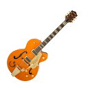 GRETSCH G6120T-55 Vintage Select Edition '55 Chet Atkins Hollow Body with Bigsby Vintage Orange Stain Lacquer エレキギターギタリストの中のギタリストである、チェット・アトキンスと共同設計された、由緒ある6120は、今も最も広く耳にされるグレッチギターの1機種です。G6120T-55 Vintage Select Edition '55ChetAtkins Hollow Body with Bigsbyは、オリジナルのデザインを備え、驚異的でクラシックな美学に忠実なギターです。真の音のマルチツールである、このホロウディ・モデルは、演奏し易い快適な感触を持ち、我々伝統の「That Great Gretsch Sound！」で、誇らしげに鳴り響きます。2基のTV Jones T-ArmondシングルコイルPUは、明瞭かつ、音のディテールをたっぷり備えた多彩なトーンを生み出します。搭載された従来のグレッチらしいコントロールを使用すると、PUのサウンドをブレンドして形成でき、無数の音色のバリエーションを作成できます。グレッチの新しい“Squeezebox”ペーパーイン・オイルコンデンサーが追加されることで、信じられないほど洗練された音の減退感と、絹のような滑らかなヴィンテージの高音域が得られます。標準の“U”字型メイプルネックに、ラジアス12インチ(304.8ミリ)のエボニー指板と、22個の耐久性に優れたミディアム・ジャンボフレットを搭載。どんなスタイルでも、印象に残る演奏体験が可能です。ピン留めされたアルミニウム補正ブリッジは、Bigsby B6GBVFビブラートテールピースと連動し、安定したチューニングを実現。ヴィンテージ・スタイルのポリッシュド・アルミニウムナットが、スナッピーで特徴的なトゥワンギーさを生み出します。ピュアなトーンと快適な演奏性のために設計されたこのギターは、ゴールドのGアロー・コントロールノブ、黒い縁飾り付きのエイジド・ホワイトバインディング、耐久性のあるグロス・ニトロセルロースラッカー・フィニッシュを使用し、クラシックなウエスタンモチーフを採用した、エイジドパール・ブロックインレイを装備。グレッチロゴ入り、厚いヴィンテージ・スタイルのゴールド・プレキシピックガード、Grover Sta-Titeゴールドチューナーなど、グレッチファンが望む伝統的な仕様の約束ごとを備えています。エレガントで洗練されたスタイルとサウンドを備え、現在に復活したG6120T-55Vintage Select Edition '55Chet Atkins Hollow Body with Bigsbyは、グレッチの黄金時代をリスペクトする愛好家を満足させること間違いなしです。【スペック】・カラー：Western Orange Stain Lacquer・原産国：JP・オリエンテーション：Right-Hand・Platform：Nashville / G6120・シリーズ：Professional Collection・Fingerboard Material：Rosewood・フィンガーボードラジアス：12" (305 mm)・ヘッドストック：Early '50s Gretsch・ネックフィニッシュ：Gloss Nitrocellulose Lacquer・ネック：Maple・ネックシェイプ：Standard "U"・フレット数：22・ナットの素材：Polished Aluminum・ナット幅：1.6875" (42.86 mm)・ポジションインレイ：Aged Pearloid Blocks・ナット：Polished Aluminum・ボディ：Laminated Flame Maple・ボディバインディング：Aged White with B/I Purfling・ボディフィニッシュ：Gloss Nitrocellulose Lacquer・ボディ素材：Laminated Flame Maple・ボディシェイプ：Nashville / G6120・Body Style：Gretsch Hollow Body Guitars・ボディトップ：Laminated Flame Maple・ブレイシング：Parallel Tone Bars・Cutaway：Single Cutaway・ブリッジ：Compensated Aluminum・ブリッジカバー/テイルピース：Bigsby B6CBVF Vibrato Tailpiece・Bridge Mounting：Pinned・コントロールノブ：Arrow・ハードウェアフィニッシュ：Gold・Neck Plate：NA・ピックガード：Gold Plexi with Black Gretsch Logo and Artist Signature Sign Post Graphic・ストリング：Nickel Plated Steel (.011-.049 Gauges)・チューニングマシーン：Grover V98 Sta-Tite Open-Back・ブリッジピックアップ：TV Jones T-Armond・コントロール：Volume 1. (Neck Pickup), Volume 2. (Bridge Pickup), Tone・ネックピックアップ：TV Jones T-Armond・ピックアップコンフィギュレーション：Dynasonic / Dynasonic・Switching：3-Position Toggle: Position 1. Bridge Pickup, Position 2. Bridge and Neck Pickups, Position 3. Neck Pickup・ケース付き