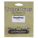 TonePros TPFR-N Metric Tuneomatic Large Posts Roller Saddles ニッケル ギター用ブリッジ※サイズ間違いなどがございませんように、サイズを測ってからのご注文をお願い致します。※ギターパーツの取り扱いには、相応の技術と知識が必要になります。自己責任にて取り扱い可能な方のみ、ご検討下さい。取り付け時に起った、楽器及びパーツの破損・損傷等につきましては当店は保証出来ません。あらかじめご了承下さい。※取り付け作業後の商品につきましては、いかなる理由でも返品は受付出来ません。TPFRは、TonePros設計のローラーサドルを採用することで、Bigsbyスタイルのトレモロが付いたギターで優れたパフォーマンスを提供します。ナッシュビル・ラージ・ポスト・タイプのTOM(Tune-O-matic)ブリッジで、多くの日本製、アジア製のギターに搭載可能なブリッジです。弦高、イントネーション調整後、ブリッジ本体とスタッドをイモネジで固定する独自の特許取得済み「SystemII」構造により、ブリッジのがたつきがなくなり弦の振動をしっかりボディーに伝え、イントネーション、サスティンが向上します。またブリッジが固定されている事で、弦交換の際ブリッジが外れる事がなく弦交換前のイントネーション、弦高が保たれます。【注意点】図面を参照し、サイズを確認して下さい。ToneProsをギター本体へ加工無しで取り付けができない場合は、楽器店、リペアショップ等にご相談して頂くようお願い致します。無理に交換・取り付けをすることによって、ギターに損傷・故障、また思わぬ怪我をする場合があります。そのような場合、TonePros商品の不具合以外は保証できかねますのでご了承ください。【Specs】Radius: 約304.8mm / 12” ※1弦ー6弦のサドルのRSaddle material: Zamak ※亜鉛に，約4％のアルミニウムと，少量の銅，微量のマグネシウムを添加した亜鉛合金Wrench: 1.5mmN:ニッケル