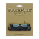 TonePros T1ZA-B Metric Aluminum Tailpiece ブラック ギター用テールピース※サイズ間違いなどがございませんように、サイズを測ってからのご注文をお願い致します。※ギターパーツの取り扱いには、相応の技術と知識が必要になります。自己責任にて取り扱い可能な方のみ、ご検討下さい。取り付け時に起った、楽器及びパーツの破損・損傷等につきましては当店は保証出来ません。あらかじめご了承下さい。※取り付け作業後の商品につきましては、いかなる理由でも返品は受付出来ません。50's Vintageスタイルの軽量アルミ製テールピースセット。アルミ製のボディは共鳴性を高め、ToneProsの特許取得済みのロック構造により、ギターにしっかりと固定することで弦の振動をボディに伝え、イントネーション、サスティンが向上します。T1ZAは、ミリ規格のスタッド＆アンカーを付属したテールピースセットです。殆どの日本製、アジア製のギターに搭載可能なモデルです。またテールピースが固定されている事で、弦交換の際テールピースが外れる事がなく弦交換前のセッティングが保たれます。【注意点】図面を参照し、サイズを確認して下さい。ToneProsをギター本体へ加工無しで取り付けができない場合は、楽器店、リペアショップ等にご相談して頂くようお願い致します。無理に交換・取り付けをすることによって、ギターに損傷・故障、また思わぬ怪我をする場合があります。そのような場合、TonePros商品の不具合以外は保証できかねますのでご了承ください。【Specs】Stud material: BrassTailpiece material: AluminumWrench: 1.5mmB:ブラック