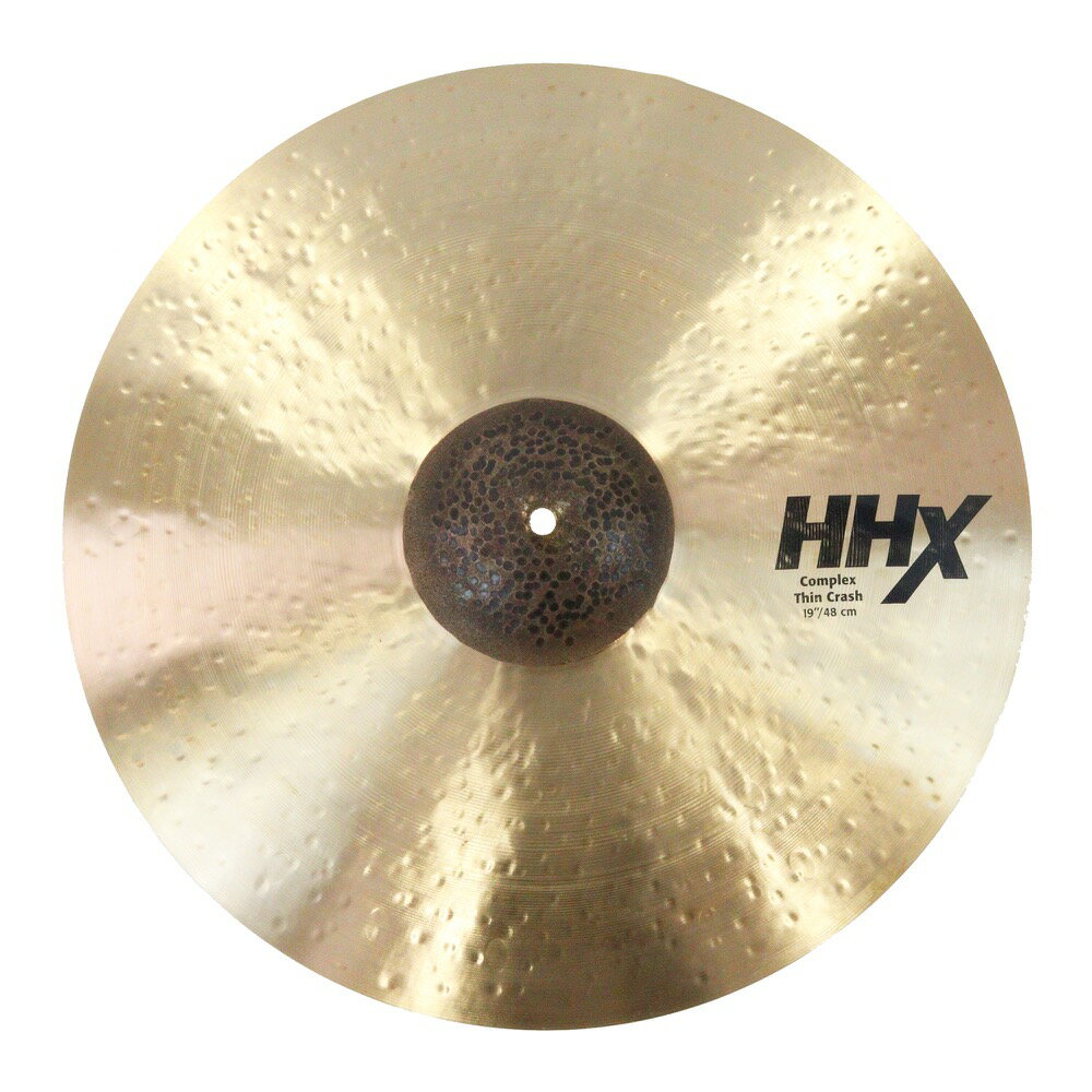 SABIAN HHX-19CTC HHX COMPLEX THIN CRASH 19インチ クラッシュシンバルこれまでに培ってきたEvolution、Legacy、Artisanのテクノロジーを融合することで、また新たなダークサウンドを生み出した。HHとHHXのダブルハンマリングとロウハンマリングベルを採用したコンプレックスシンクラッシュは、SABIAN史上最もリッチでスイートなクラッシュのひとつに数えられるであろう。HHXModern × DarkB20 BRONZECAST BRONZE80%Copper + 20%Tin + Trace of Silverダークトーンでクイックレスポンス。大粒のハンマリングを施し、カーブのややきつい形状にすることで、ややピッチを上げ、ロックからジャズまでフレキシブルに対応する、フルラインナップのシンバル。【仕様】ナチュラルフィニッシュサイズ：19"ウェイト：Thin