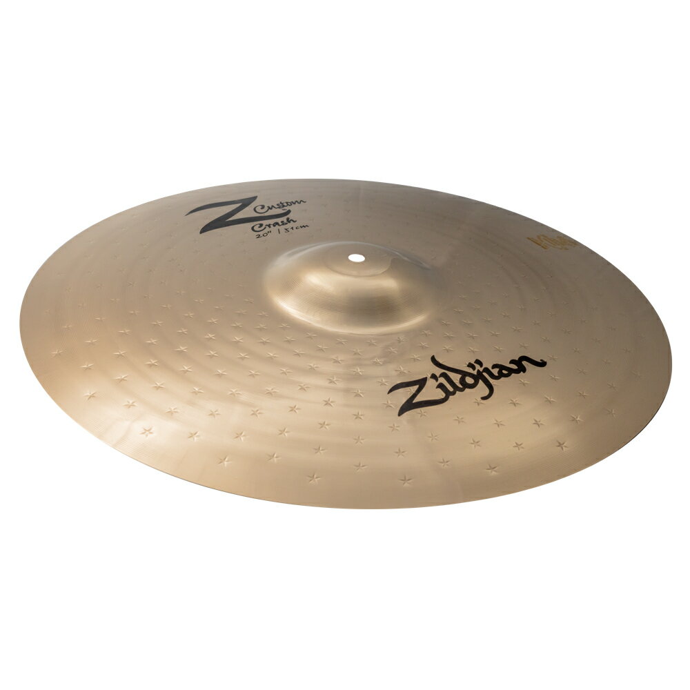 ZILDJIAN ジルジャン Z Custom 20" Crash Z40117 クラッシュシンバル1993 年に登場し、2009 年に生産完了となった Z カスタム(Z Custom)シリーズ。このたび、15 年の時を経て、多くの復活リクエストが寄せられていたこのシリーズがジルジャンラインナップに。Z カスタムは、世界的な人気の高まりを見せているメタルに最適なシリーズです。新たに生まれ変わった Z カスタムシリーズは、製造工程を見直すことで、耐久性、音楽性、演奏性が向上しました。ドラマーが長年求めてきた爆発的で明るく、大音量のサウンドを実現します。ブリリアントフィニッシュが施されたシンバルの表面には、オリジナルの Z シリーズを彷彿とさせるスターハンマーパターンが採用されています。Z カスタムの突き抜けるようなサウンドは、ステージやスタジオで無限の音楽表現を可能にします。・ジルジャンシンバルの中で最も復活リクエストが多かったシリーズ・明るく切れのある爆発的なサウンド・音色や音楽性を犠牲にすることなく、圧倒的な音の広がりを実現・向上した耐久性、音楽性、演奏性・材質:キャスト(B20 ブロンズ)あらゆるドラムキットに比類なきパワーとエネルギーをもたらすハードヒッティングドラマーのためのクラッシュ。明るさ、パワー、音量を高いレベルで発揮します。品名：Z40117仕様(ウェイト)：Mediumクラッシュサイズ：20インチ