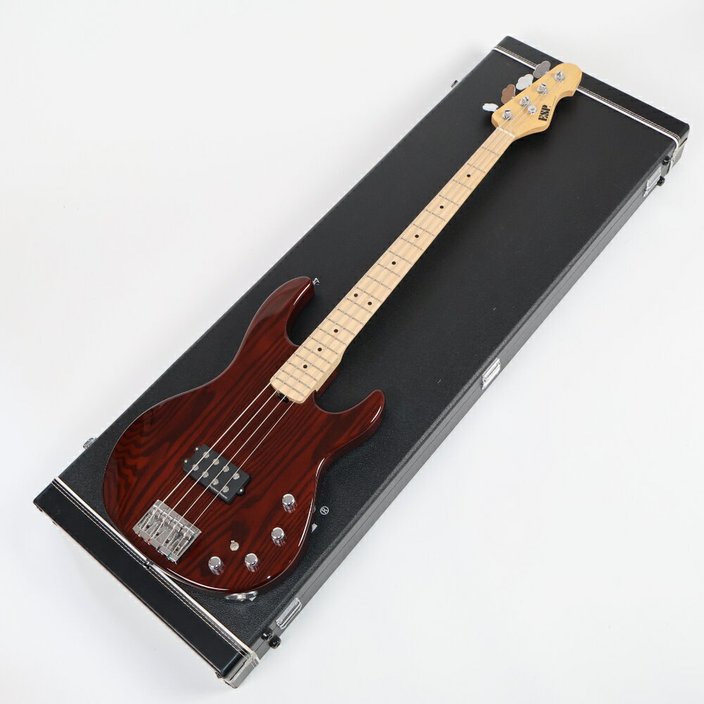 【中古】ESP AP/M See Thru brown エレキベースESP AP/M See Thru brown の中古品です。比較的綺麗なコンディションです。商品内容：本体・ハードケース小傷あり。ピックアップカバーに弾き傷あり。フレットは目立つような凹みも無く8割程度。トラスロッドは調整の余裕ありです。重量：4.48kgMADE IN JAPAN（日本製）ESPを代表するベースの一つAPシリーズの「AP/M」です。重めのホワイトアッシュボディに、ハードメイプルネックを、デタッチャブル方式ならではの音の立ち上がりのレスポンスの向上にもつながる強固な6点留めでセットしています。ピックアップには、セイモアダンカンのハムバッカーSMB-4Dを1基のみマウント。同じくセイモアダンカンの3バンドアクティブEQ回路と組み合わせています。ヴォリュームはスイッチポットになっており、ノブを引き上げることで中音域をカットし、低音域をブースとしたスラップサウンドに1発で切り替えることができます。さらには、ミニスイッチによってシリーズ/パラレル/コイルスプリットの切り替えが可能です。ブリッジ弦はブリッジに固定して張る方法と、ボディの裏から張る2種類の張り方が可能です。非常にパワフルなサウンドで、トラディショナルなスタイルながらも、プレイスタイルに合わせて幅広いサウンドメイクが可能です。BODY White Ash (Thickness 40mm)NECK Hard MapleGRIP SHAPE Thin UFINGERBOARD MapleRADIUS Compound (240-400R)SCALE 864mmNUT Unbleached Bone (38mm)FRET JESCAR FW55090-NS, 21fretsINLAY Black Acrylic DotJOINT Bolt-on (6 Bolts)TUNER GOTOH GB-11WBRIDGE GOTOH 404BO-4PICKUPS Seymour Duncan SMB-4DPARTS COLOR ChromeCONTROLS Volume (w/SLAP SW), 3 BAND EQ (Seymour Duncan STC-3M4), Series/Pararel/Coil Split Switch